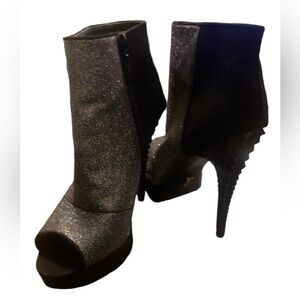 Black heel shoe boot